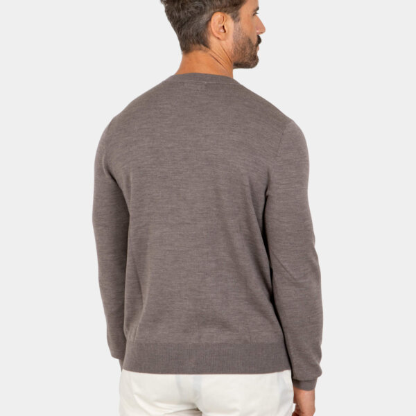 merino-wool-cardigan-brown-back Model wearing a brown Merino wool cardigan, back view.