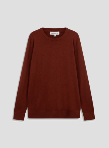 merino-wool-crew-neck-darkred-flatlay Flat-lay image of a dark red Merino wool crew neck sweater on a white backdrop.