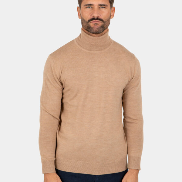 Model wearing a khaki Merino wool turtleneck sweater, front view.