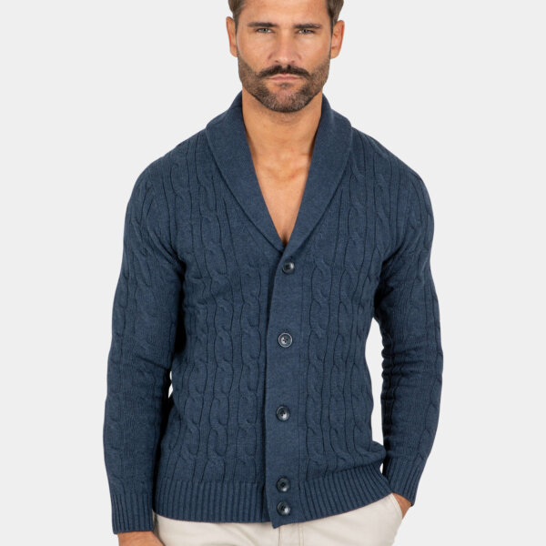 Model wearing a navy cotton button cardigan, front view.