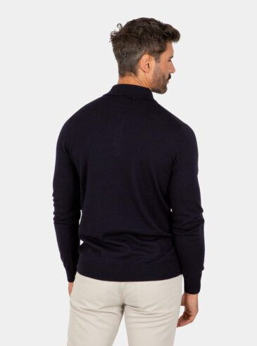 merino-wool-polo-navy-back Model wearing a navy Merino wool polo sweater, back view.