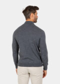 Model wearing a gray Merino wool quarter zip sweater, back view.