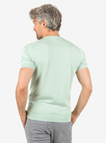 Knit Tee – Green (Back on Model) Back view of men’s green knit tee with tailored shape, worn by model