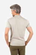 Back view of men’s open collar polo in khaki, worn by model