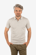 Front view of men’s open collar polo in khaki, worn by model